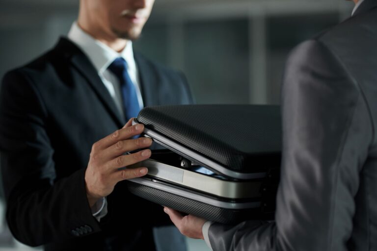 professional man opening briefcase