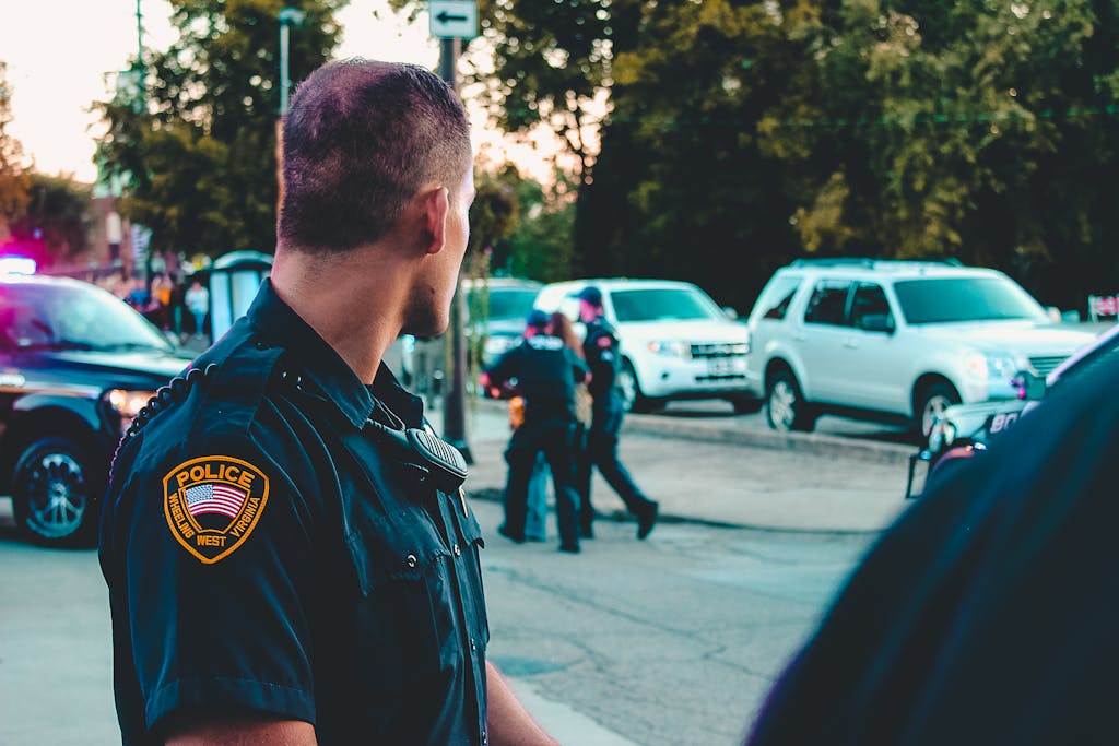 Police Officer Wearing Black Officer Uniform