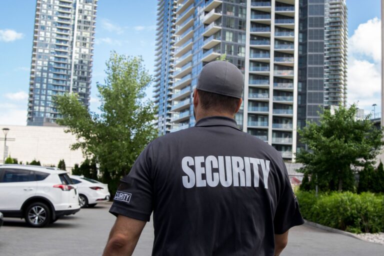 security guard in uniform patrolling a residential area